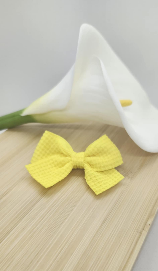 Barrette nœud jaune